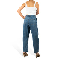 woman wearing murjer austin  shapewear barrel leg jeans in blue color with built-in tummy control and better butt lifting technology. back view