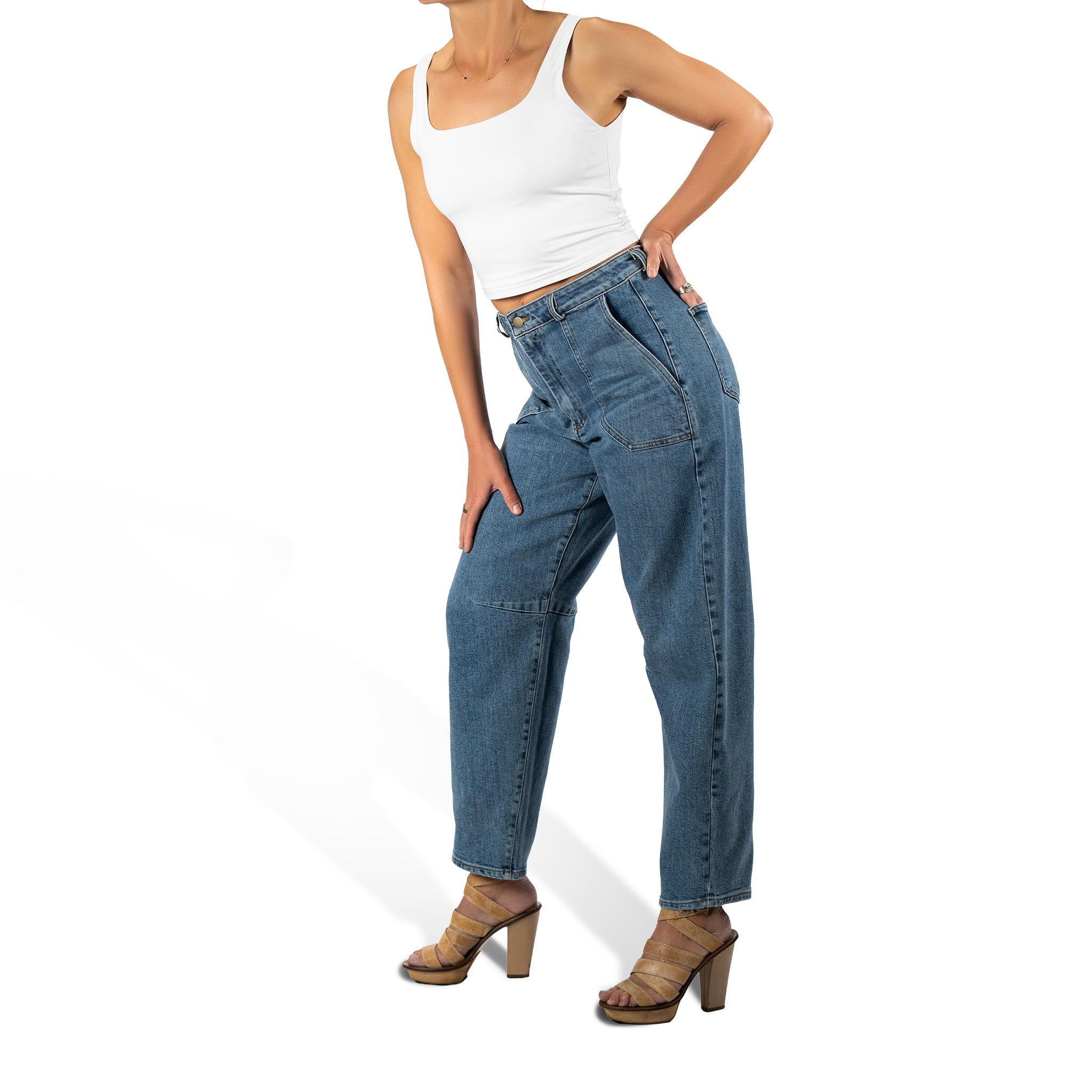 woman wearing murjer austin  shapewear barrel leg jeans in blue color with built-in tummy control and better butt lifting technology. side view