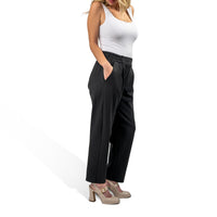 woman wearing murjer brooklyn  shapewear tapered pants in black color with built-in tummy control and better butt lifting technology. side view