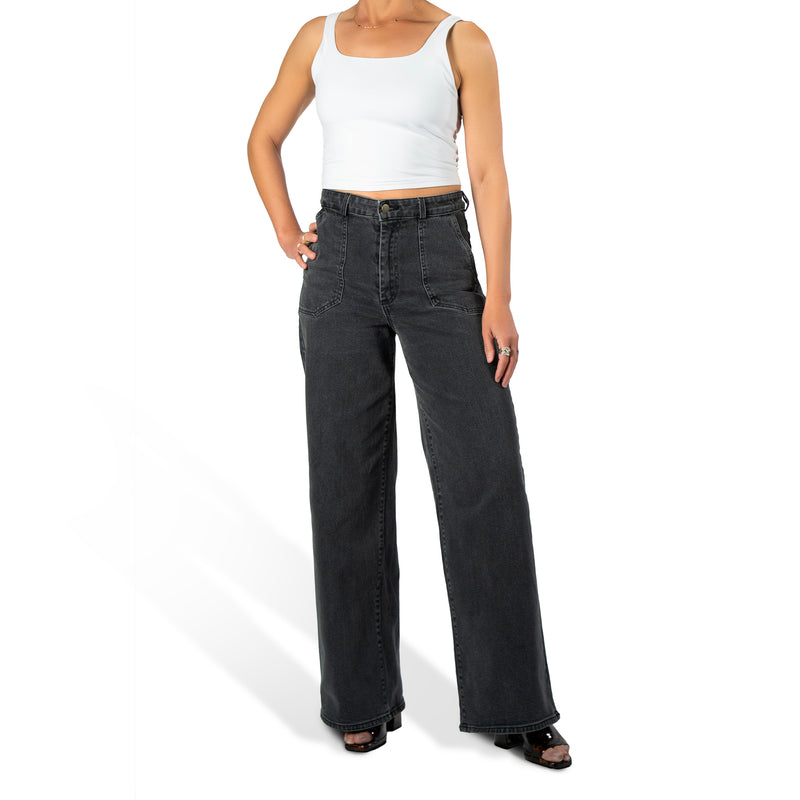 woman wearing murjer morrison  shapewear wide leg jeans in washed black color with built-in tummy control and better butt lifting technology. side view