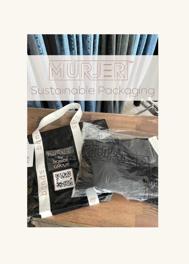 reusable murjer tote bag. black water repellant material with natural colored twill bag straps that wrap around the bag. murjer™ logo is marked on the bag straps.  murjer™ shapewear jeans and shapewear pants hang in background.
Invisible bag
image of sustainable product bag by the invisible bag company. water soluble in hot or boiling water greater than 80 degrees celsius. no pp, pe, ps, pvc plastic, non-toxic. landfill biodegradable, compostable. 