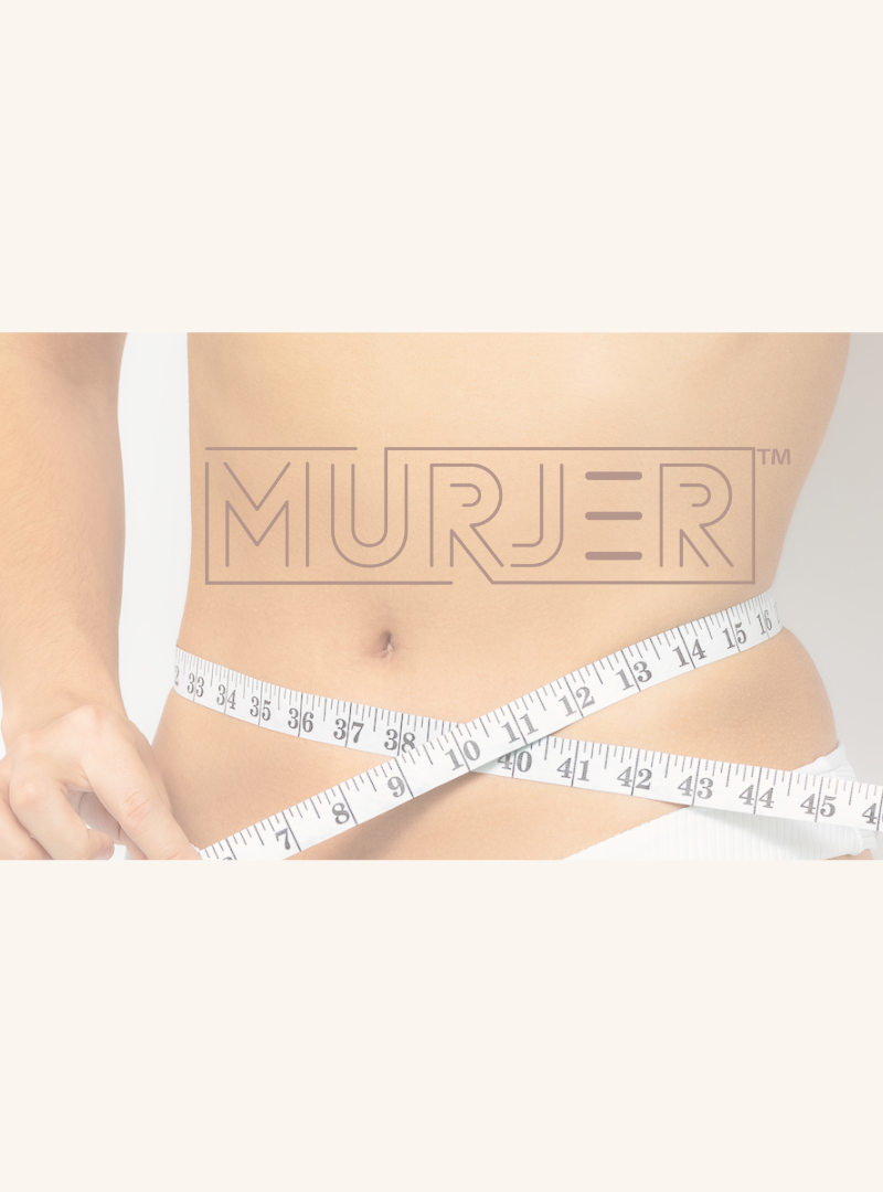 murjer logo over woman with tape measure around her waist. picture links to murjer sizing guide with help to figure out best size and tips for you to get into your first pair of MURJER™ elevated pants with built in tummy support and better butt™ tech.
