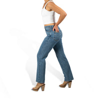 woman wearing murjer venice  shapewear straight leg jeans in blue color with built-in tummy control and better butt lifting technology. side view